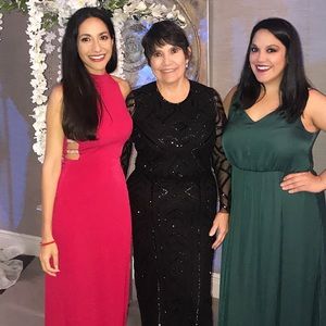 Red, high-neck formal dress.